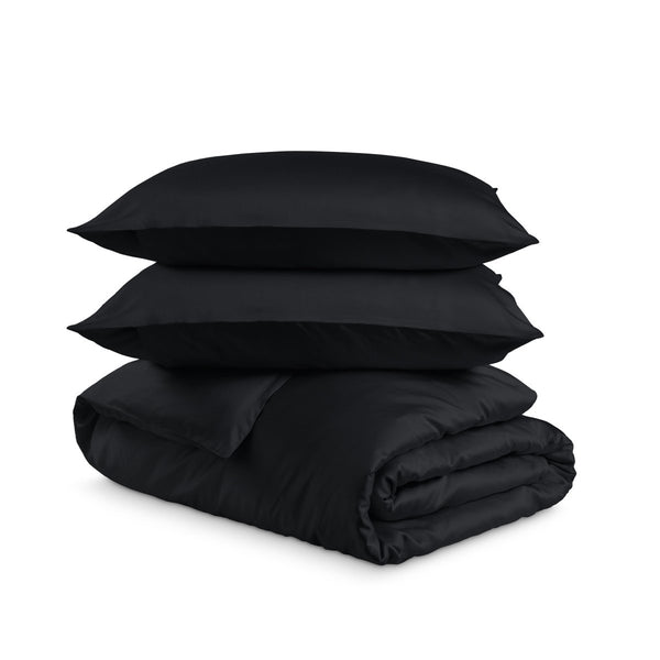 Bedding set with duvet cover and pillow shams on a white background