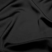 Close-up of black fabric with folds