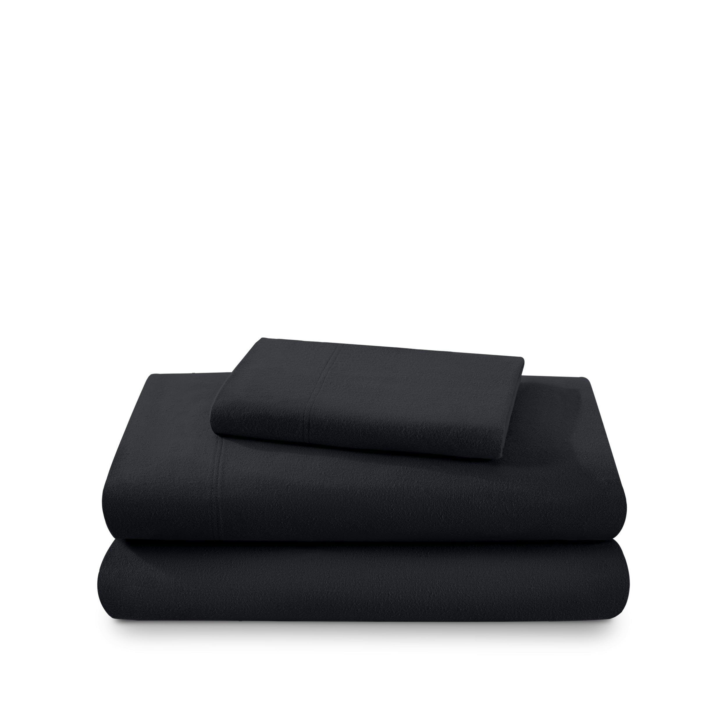 Cotton flannel sheet set folded and stacked on a white background