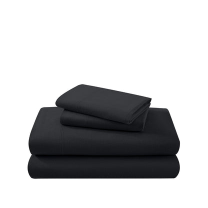 Cotton flannel sheet set folded and stacked on a white background