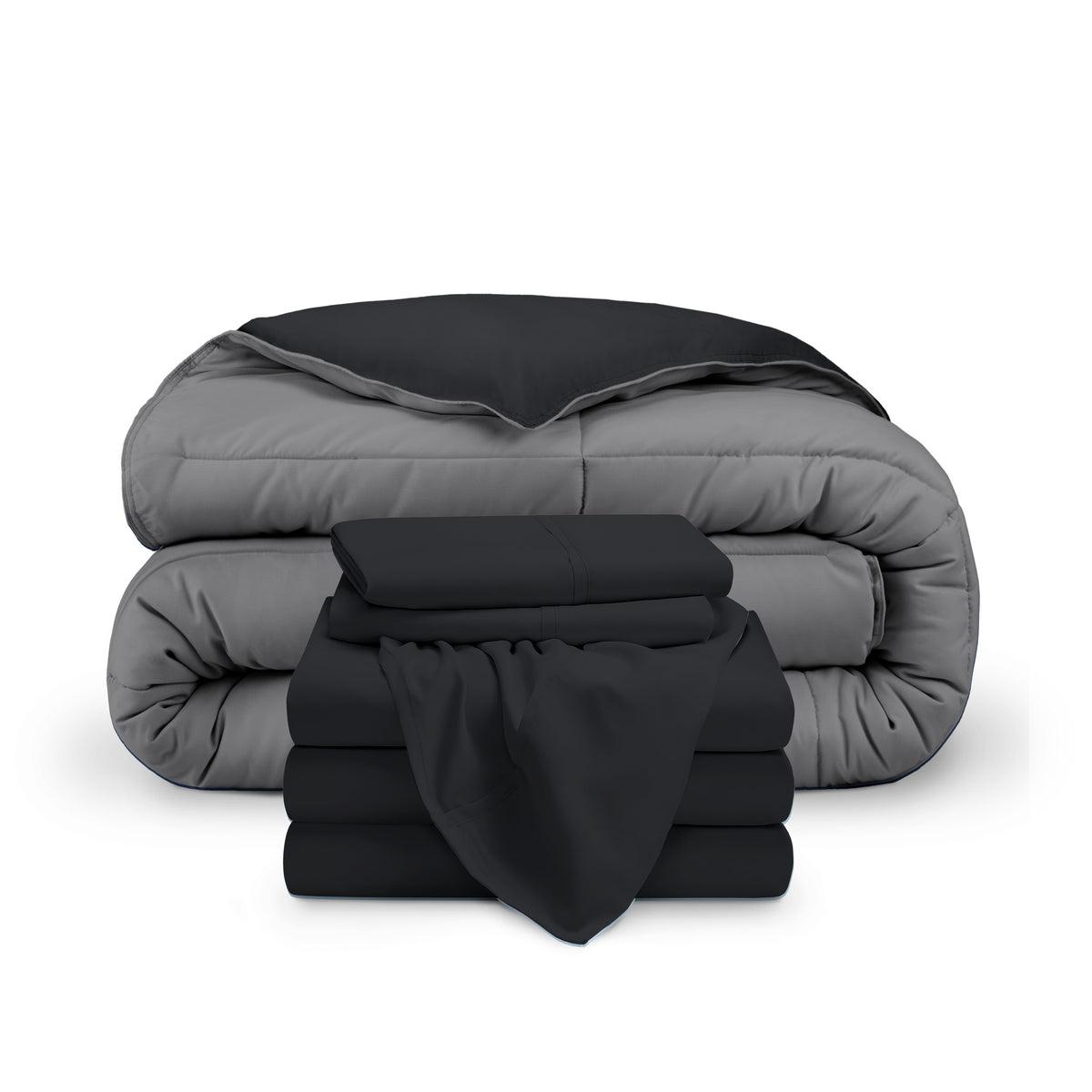 A reversible microfiber comforter and a coordinating sheet set folded and stacked