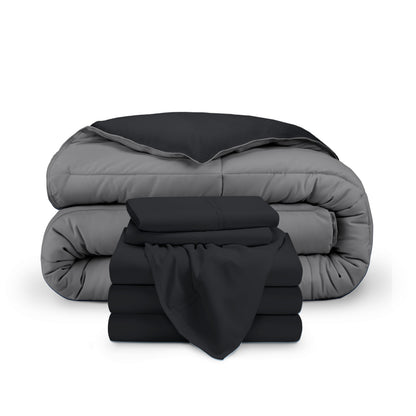 A reversible microfiber comforter and a coordinating sheet set folded and stacked