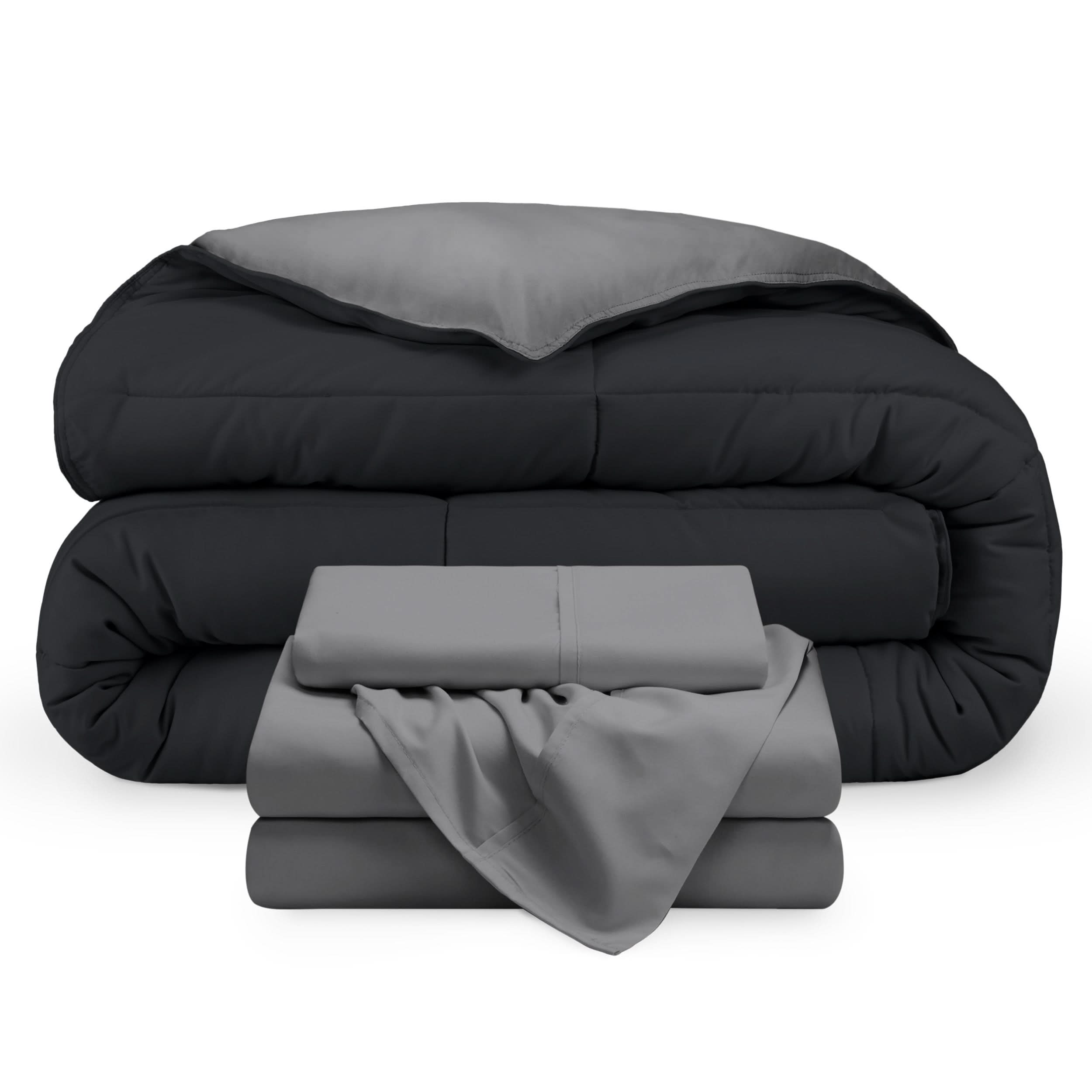 A reversible microfiber comforter and a coordinating sheet set folded and stacked