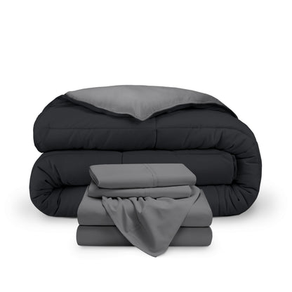 A reversible microfiber comforter and a coordinating sheet set folded and stacked