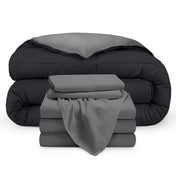 A reversible microfiber comforter and a coordinating sheet set folded and stacked