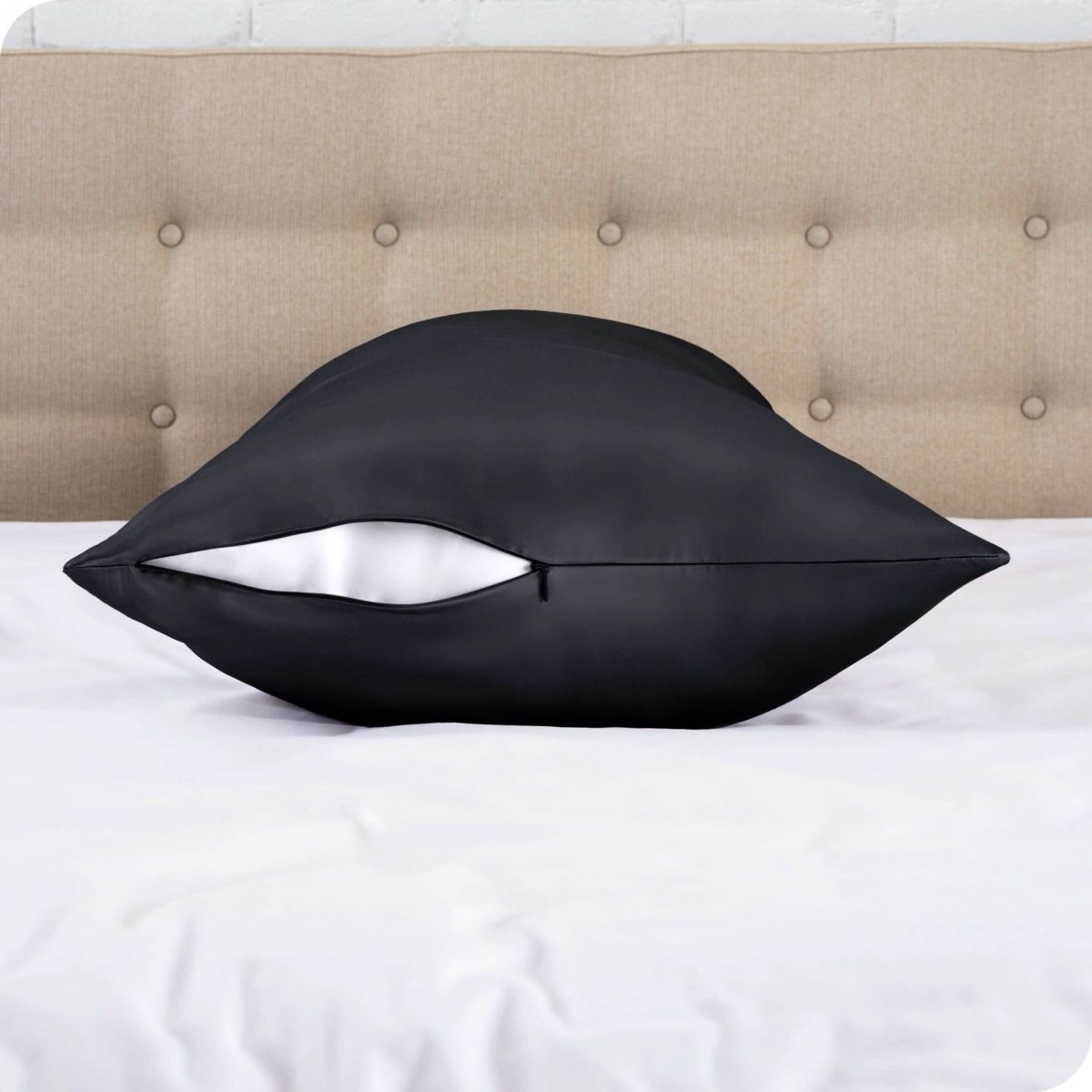 The zipper closure on a silk body pillowcase