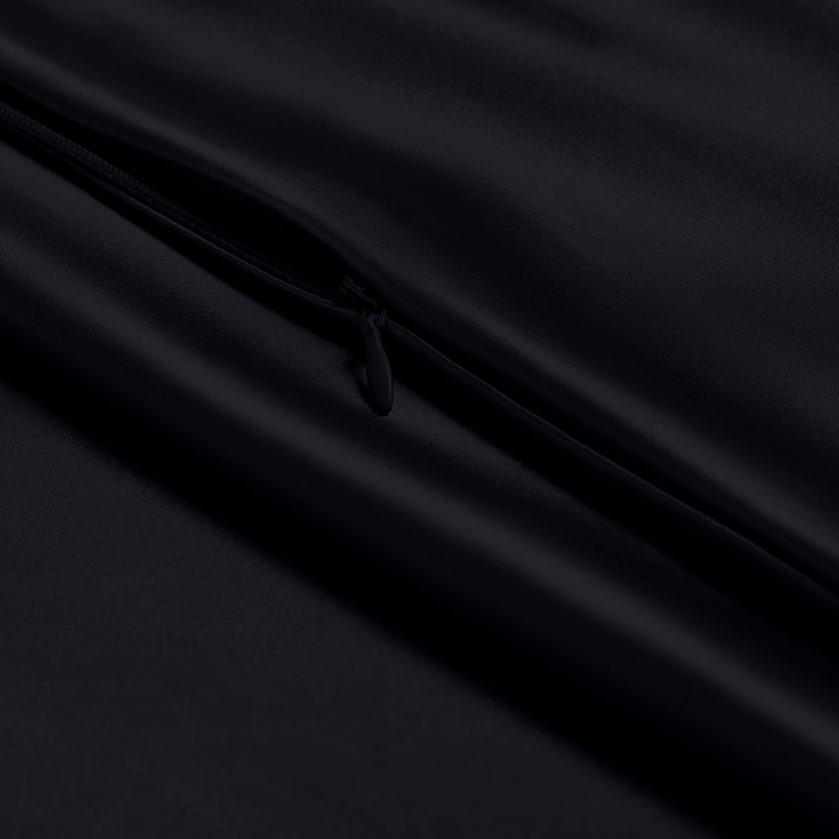 Close-up of a silk pillowcase with a zipper