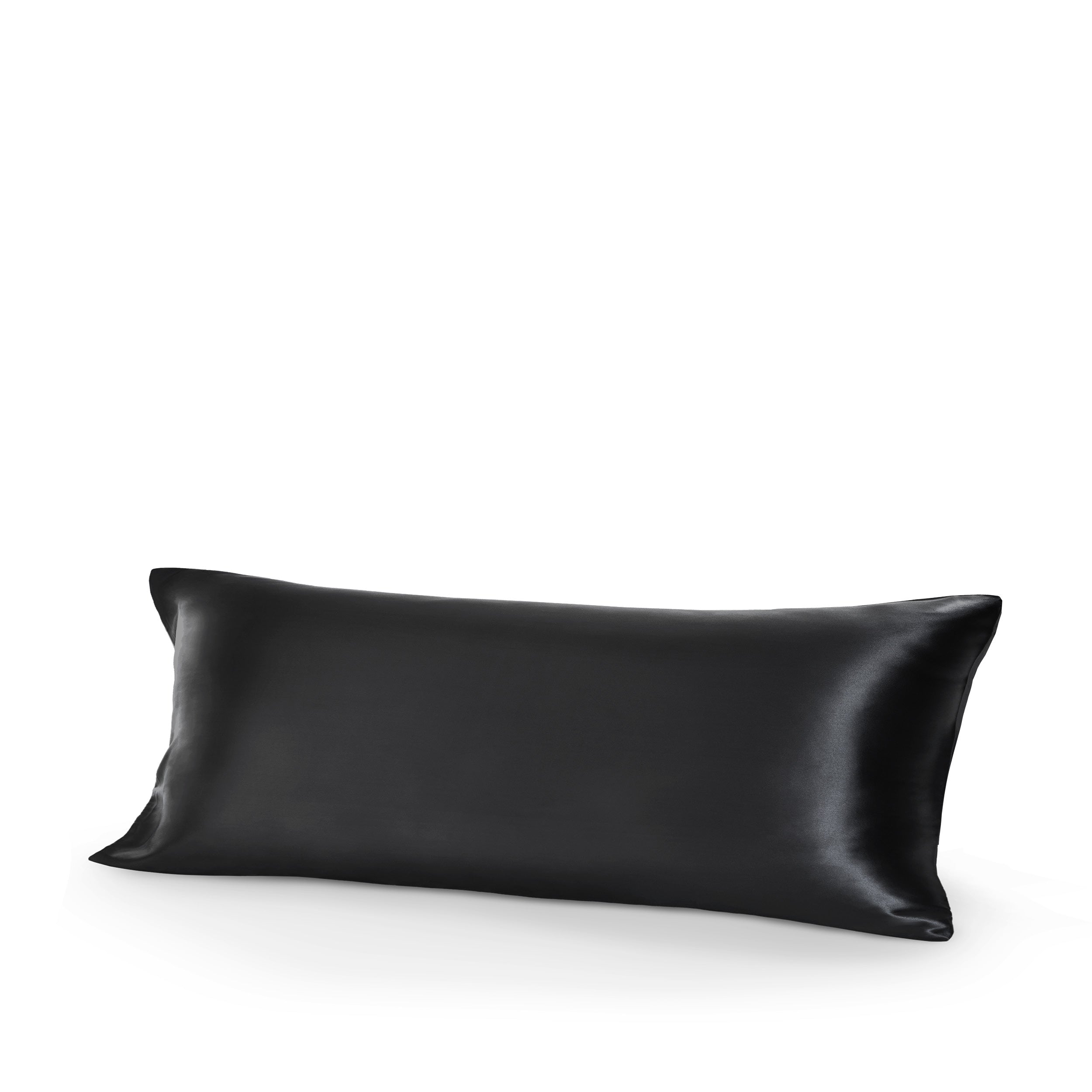 Black silk pillow on a white background