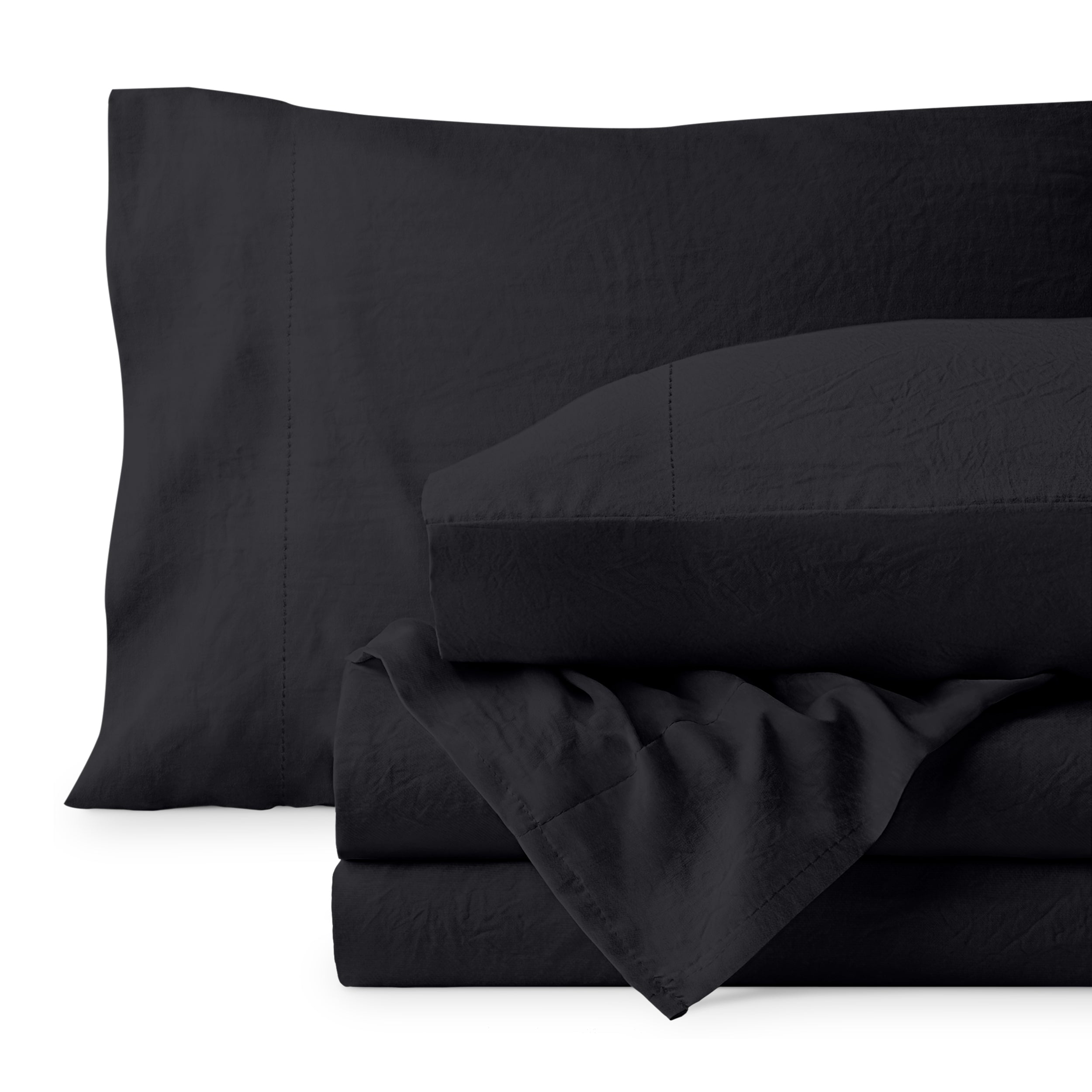 Washed microfiber sheet set folded and stacked on a white background