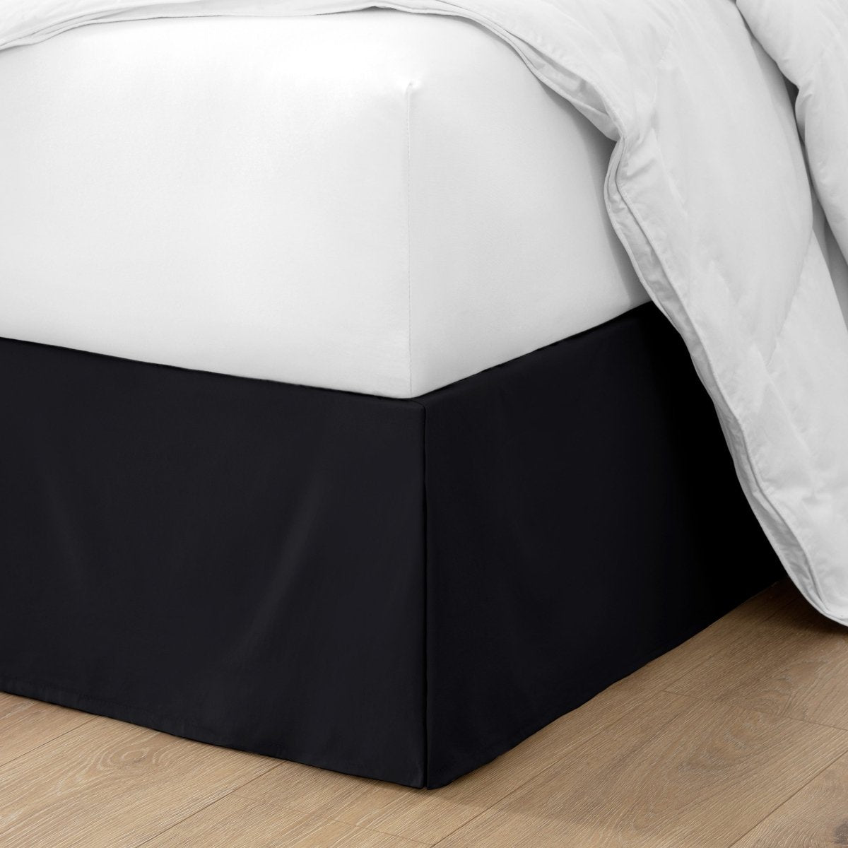 Ultra soft bed skirt on a bed with white bedding.