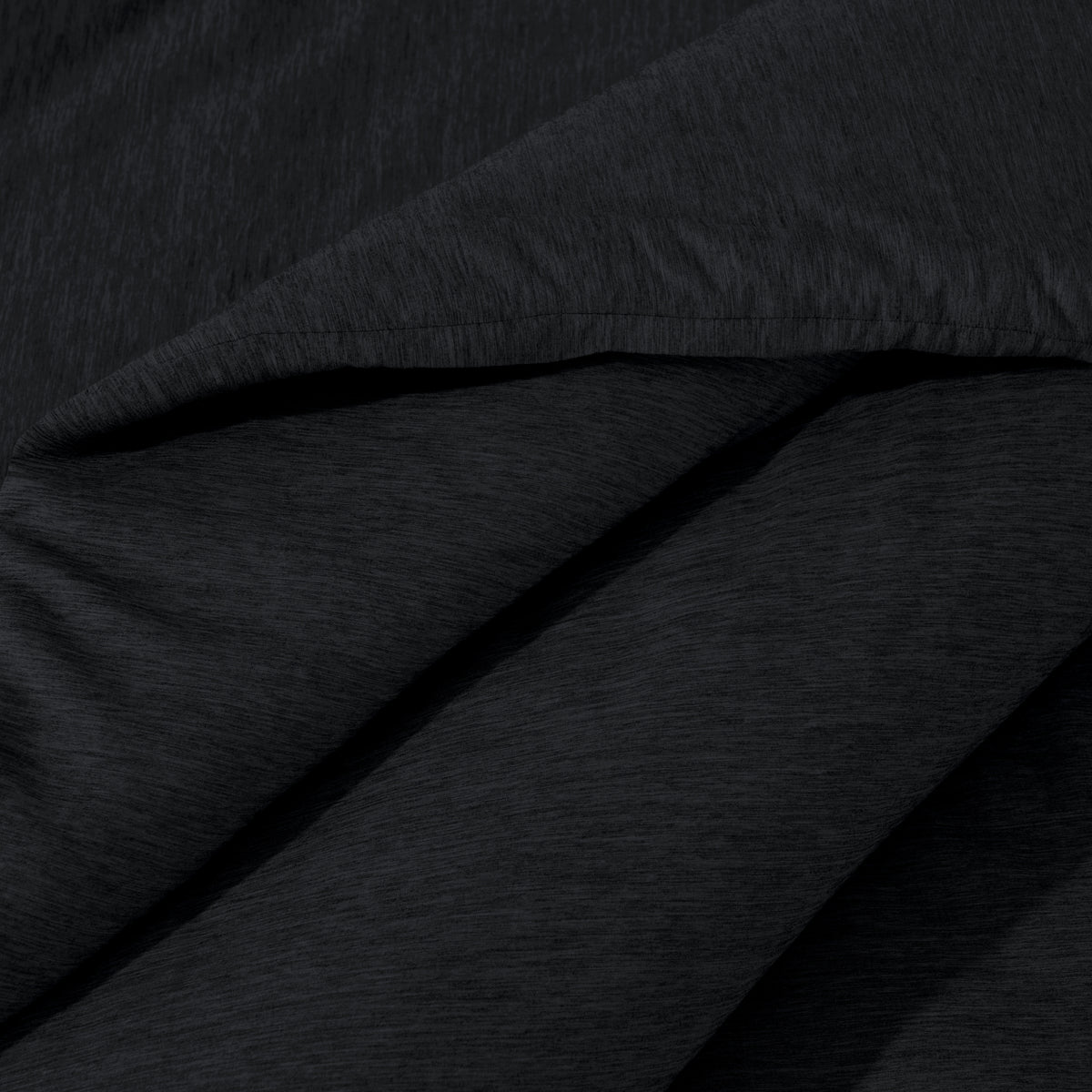 Close-up of comforter on a bed