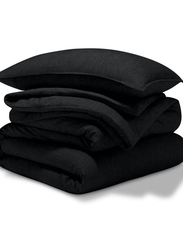A comforter set folded and stacked