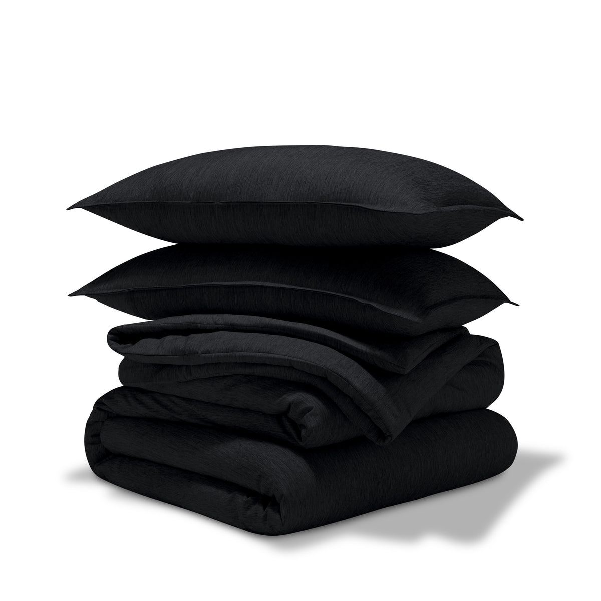 Comforter set stacked on a white background
