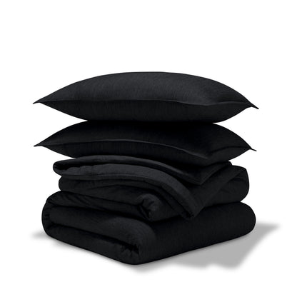 Comforter set stacked on a white background