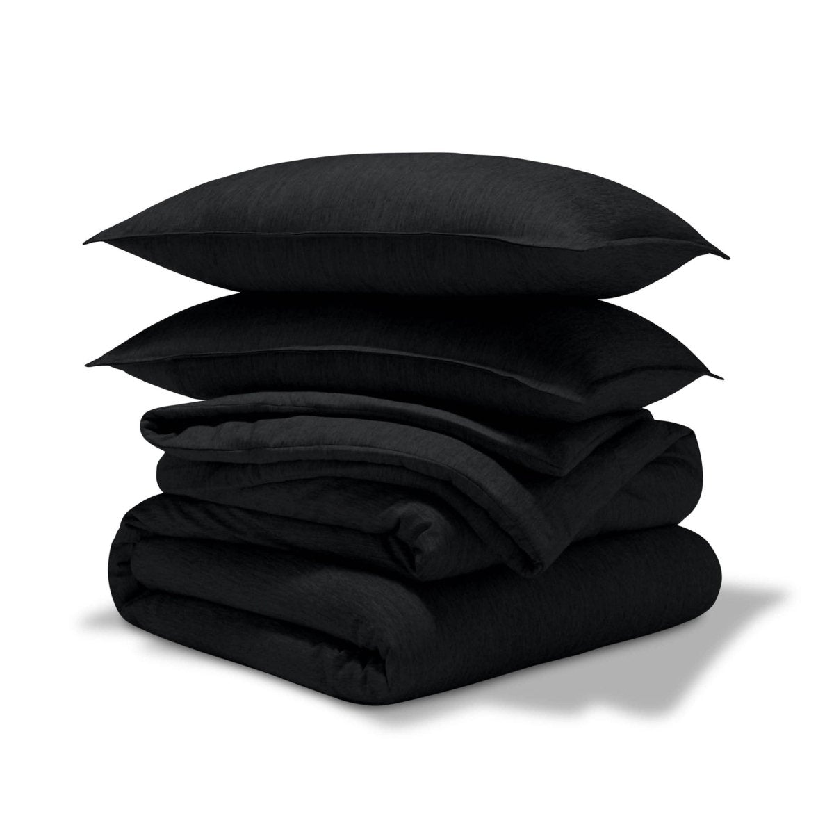 A comforter set folded and stacked