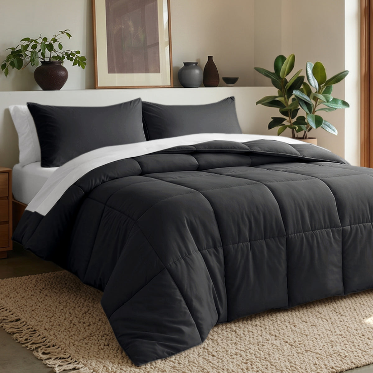 Comforter set on a bed in a bedroom with plants and decor.