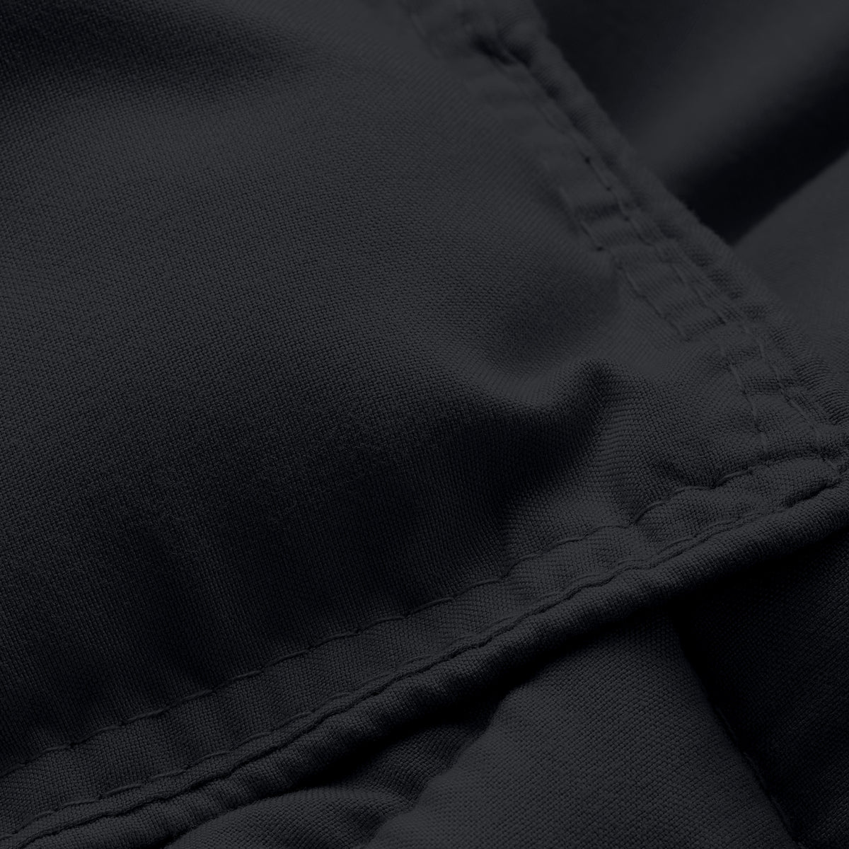 Close-up of comforter fabric with stitching detail
