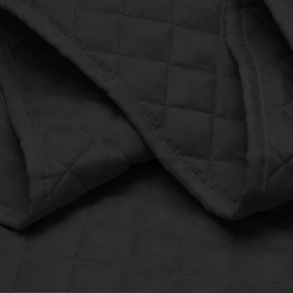 Close in view showing texture of coverlet set fabric