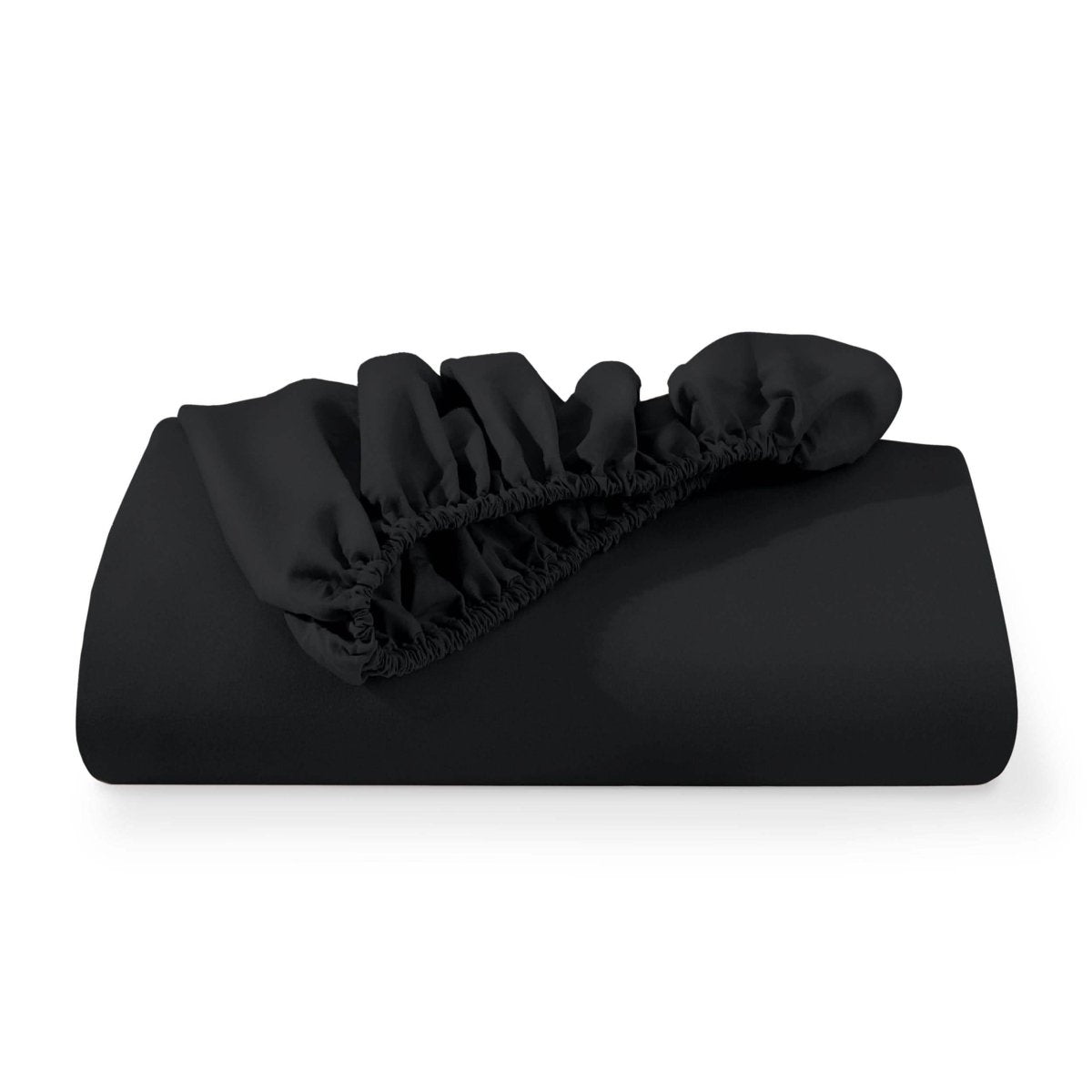 A fitted sheet folded neatly with the all around elastic showing