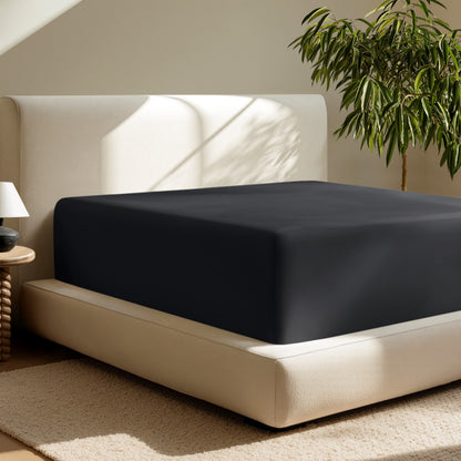 A deep pocket fitted sheet on a mattress