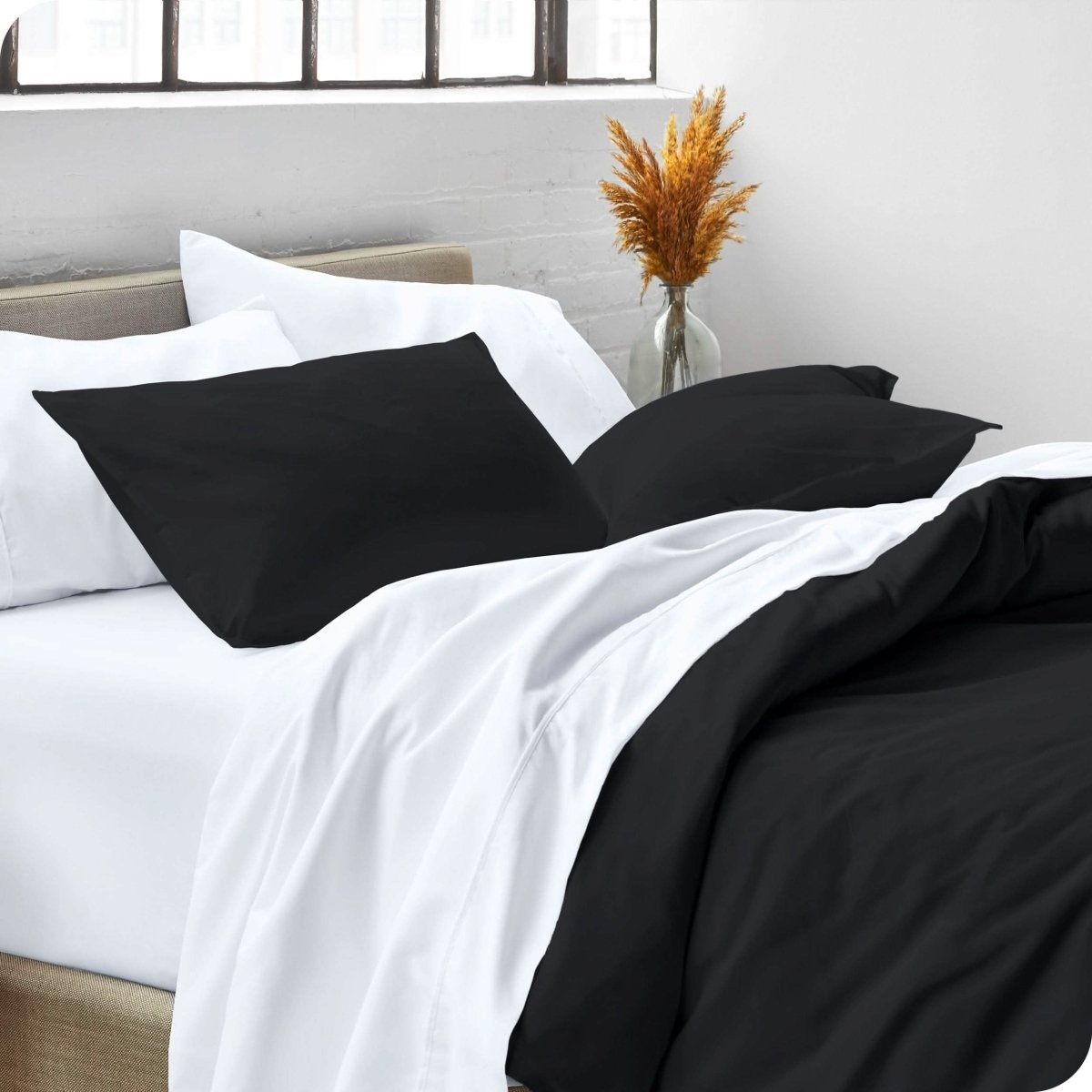 Man sleeping with his head resting on a pillow sham
