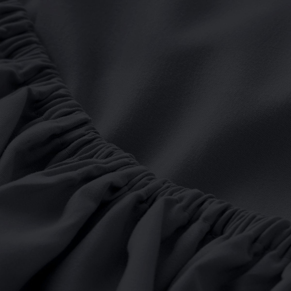 Close-up of elastic on a fitted sheet.
