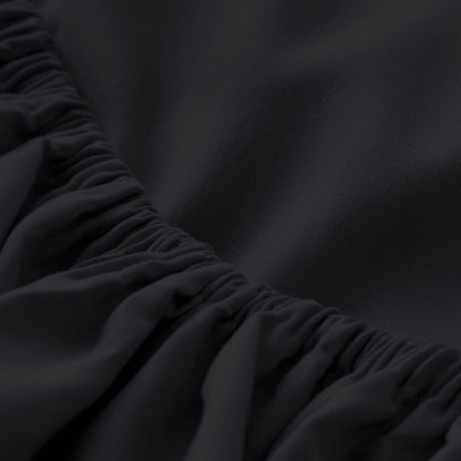 Close-up of fitted sheet with all around elastic