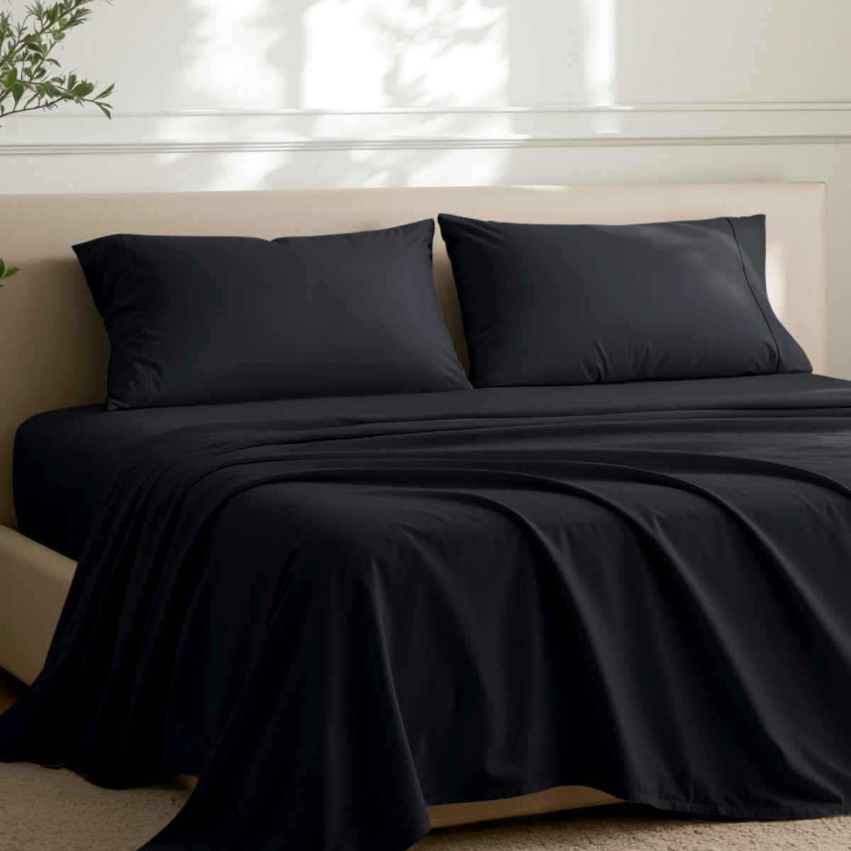 2 pillowcases on pillows on a nicely made bed