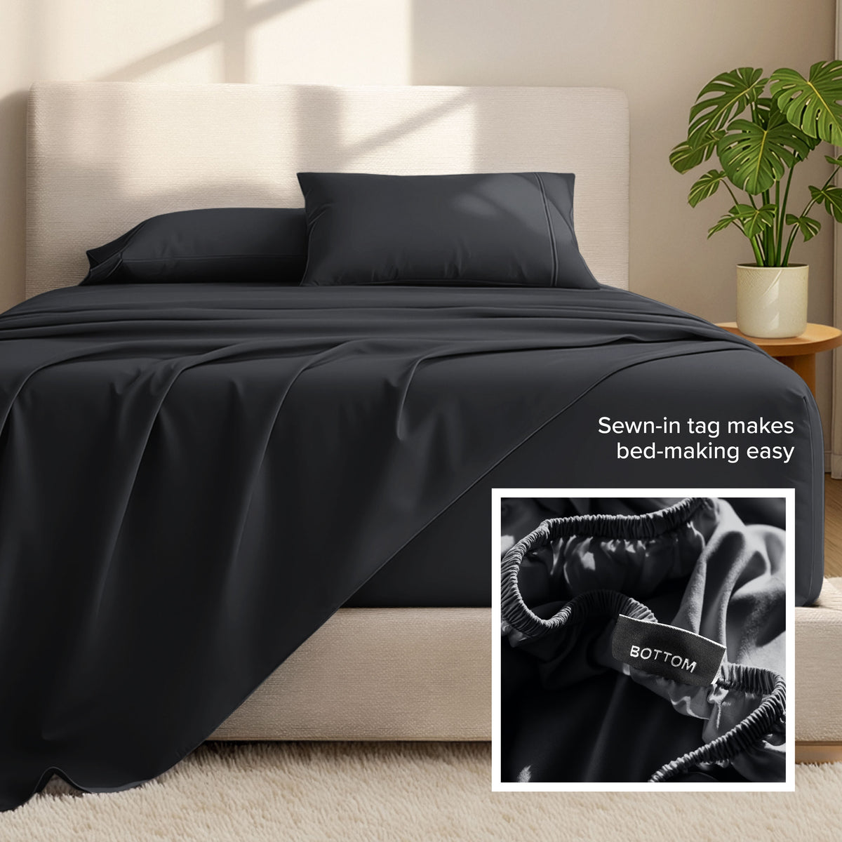 Bed sheets and pillows on a bed with a plant in the background