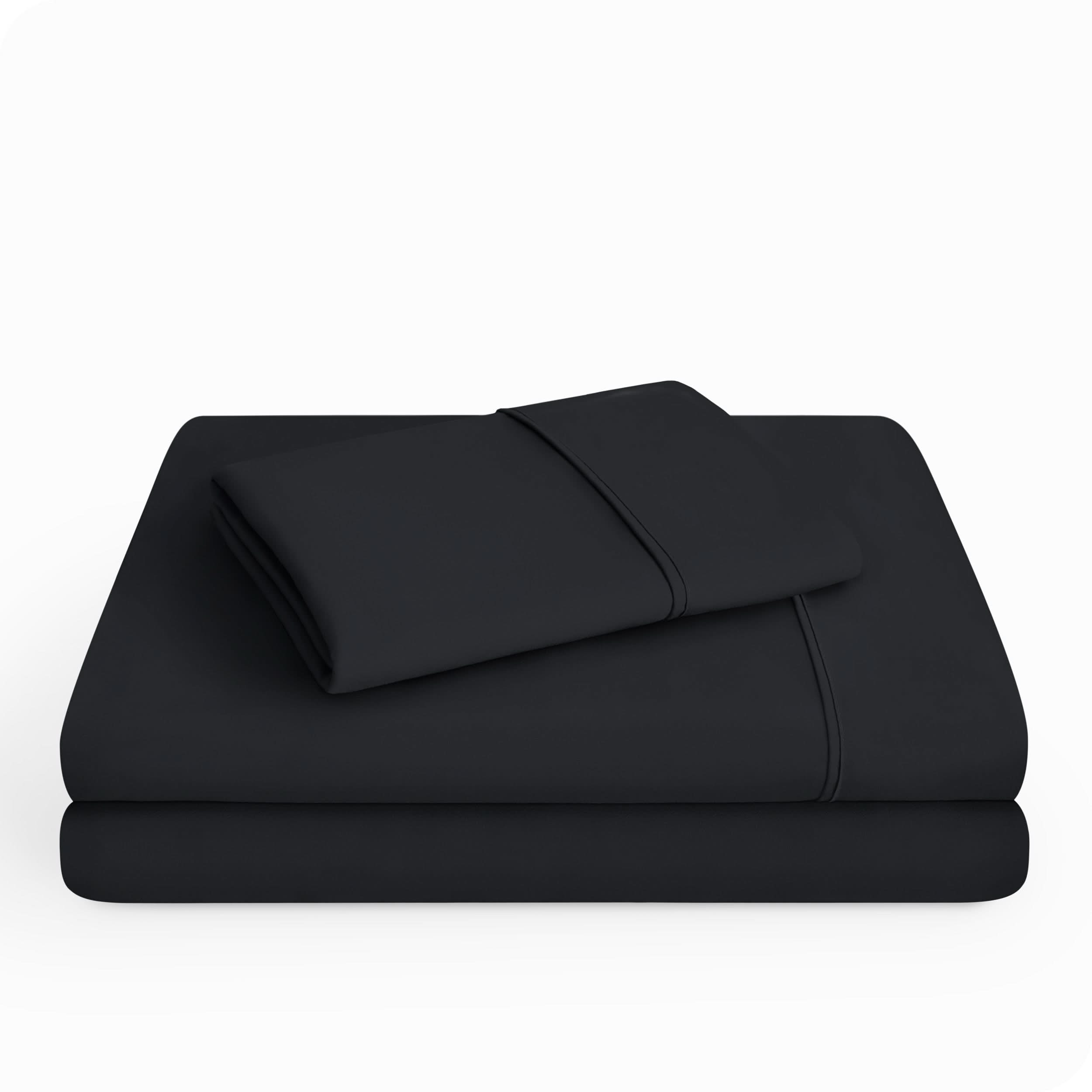 Microfiber sheet set folded and stacked neatly.