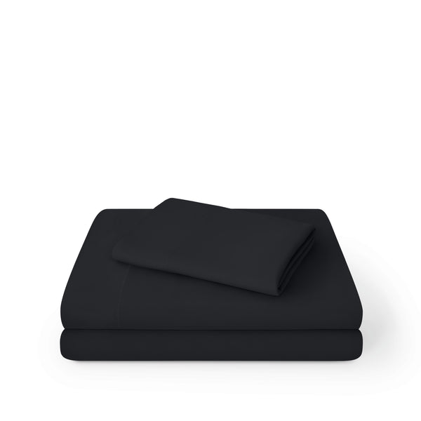 Microfiber sheet set folded and stacked on a white background