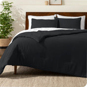 A comforter set on a bed