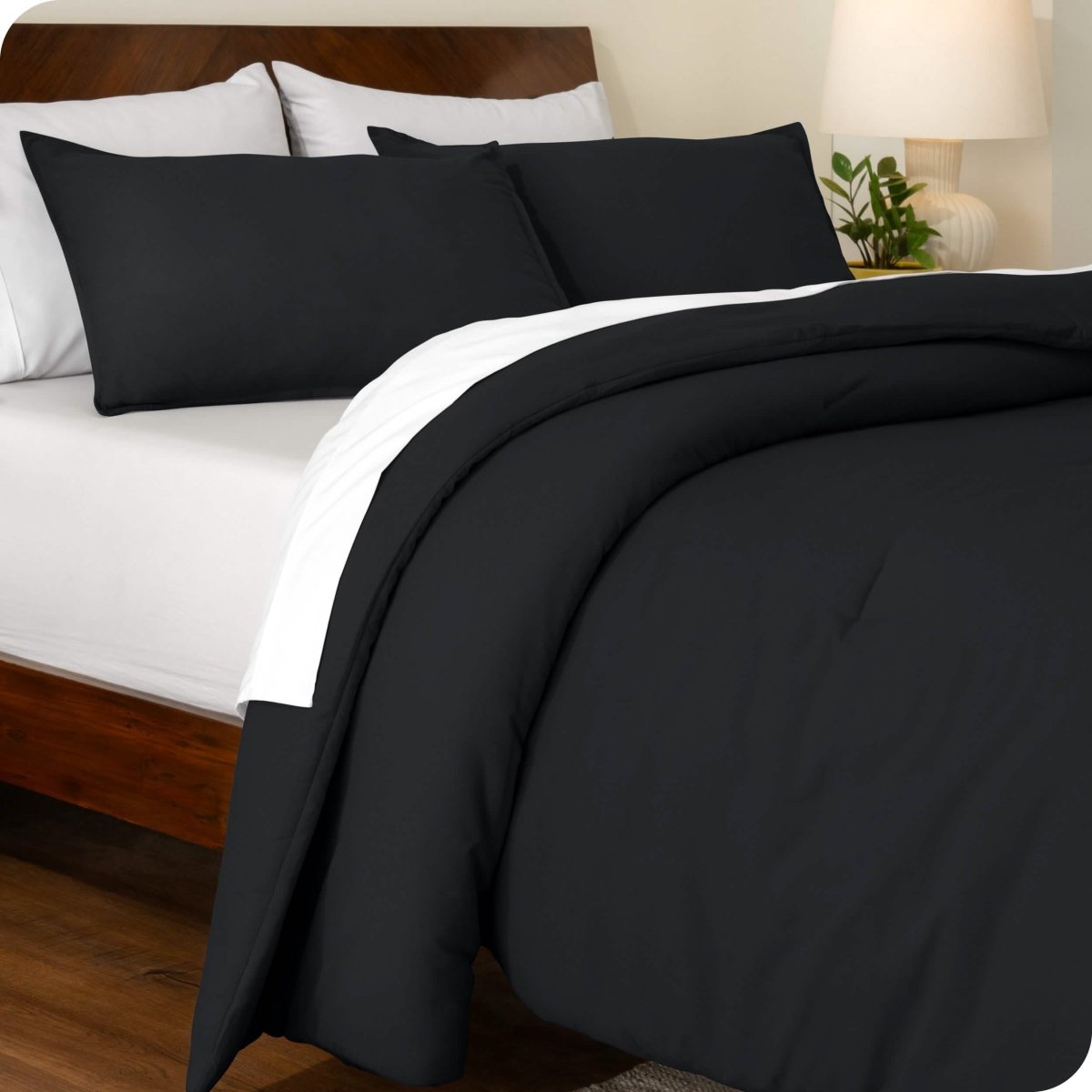 An angled view of a comforter set on a bed