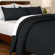 An angled view of a comforter set on a bed