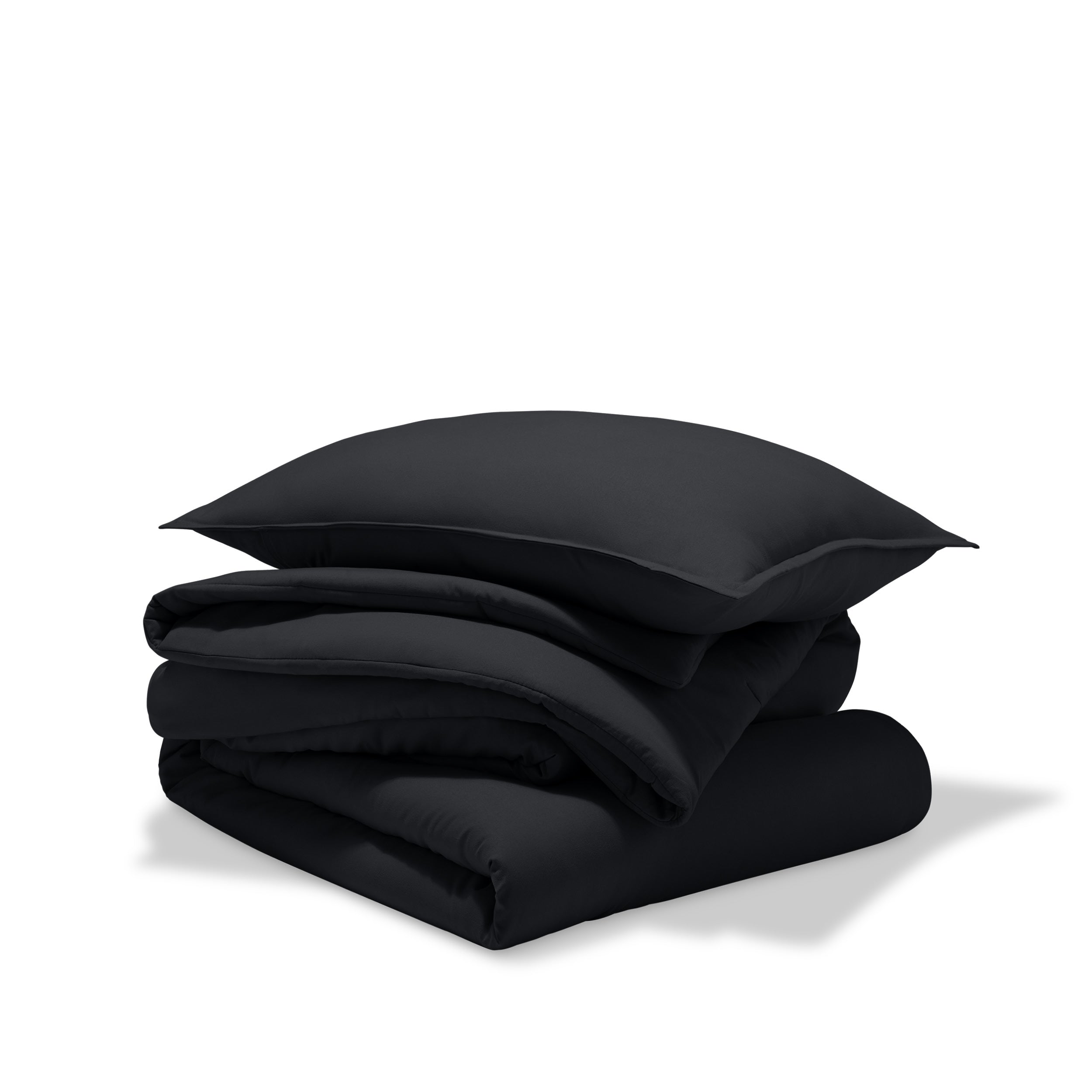 A comforter set folded and stacked