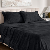 Microplush sheet set on a bed.