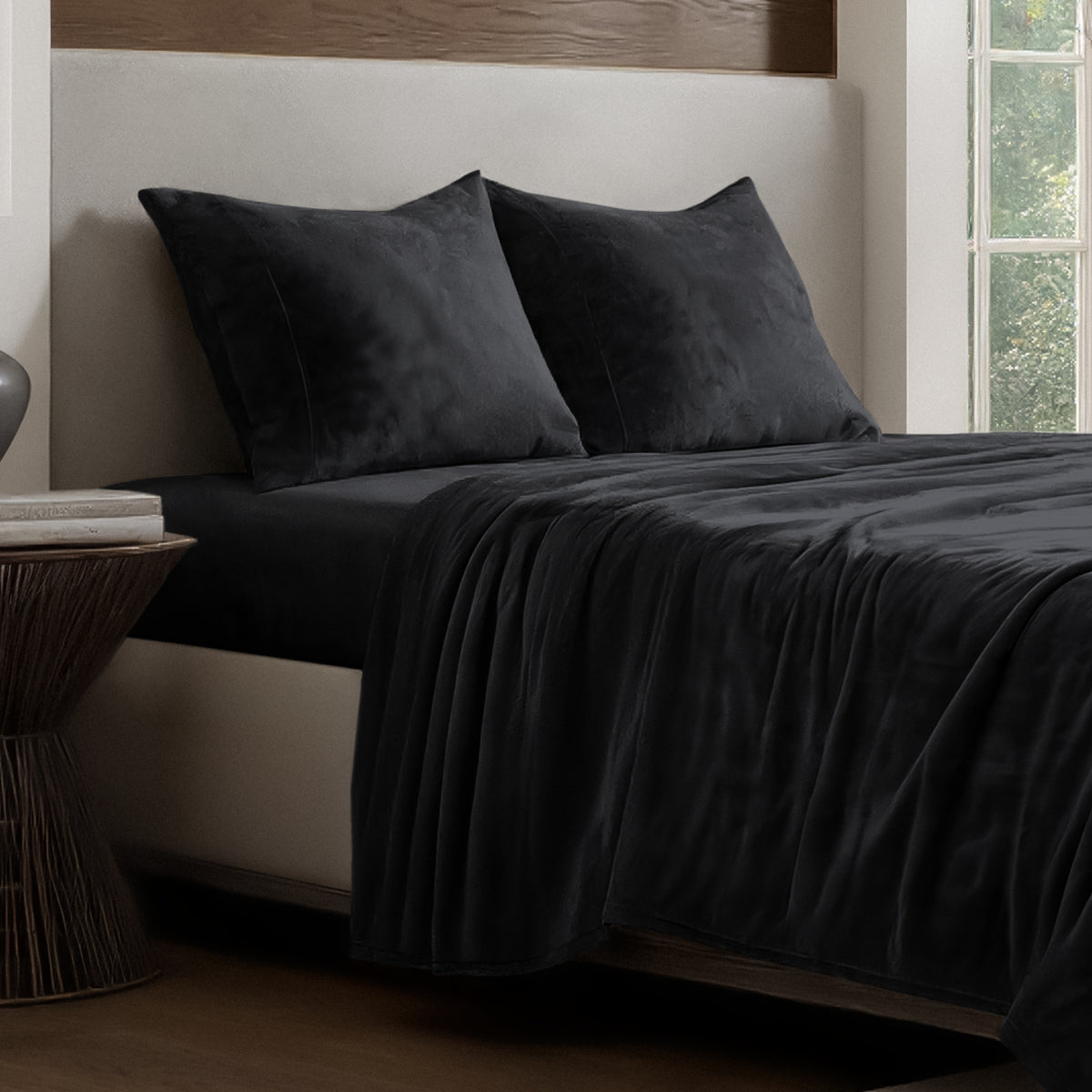 Microplush sheet set on a bed.