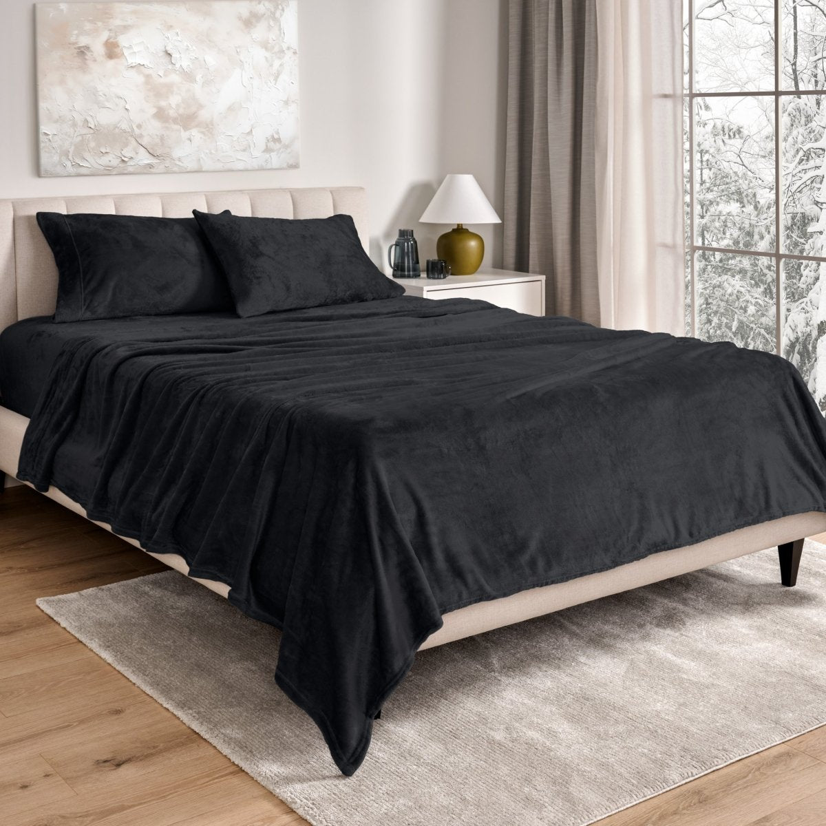 Neatly made bed in a well-lit bedroom.