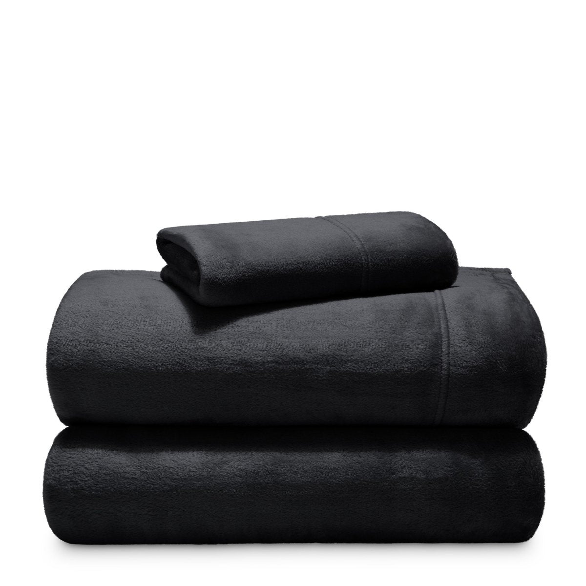 Stack of microplush sheets on a white background