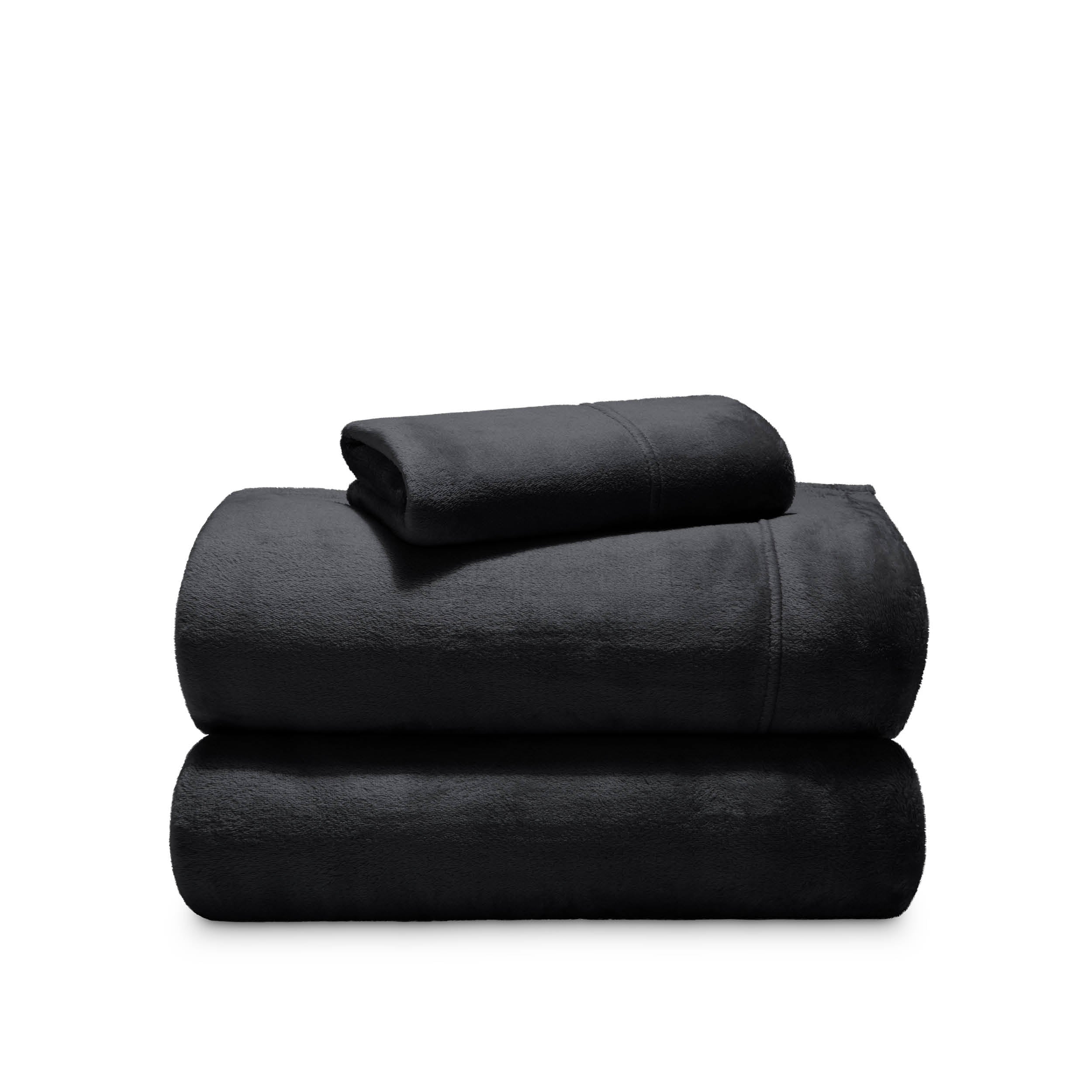 Stack of microplush sheets on a white background