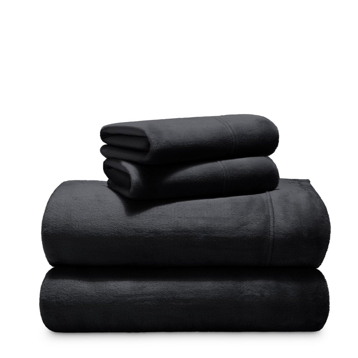 Stack of microplush sheets on a white background