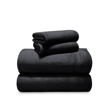 Stack of microplush sheets on a white background