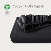 Certified GOTS Organic fitted sheet on a light gray background