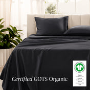 Bed with sateen bedding and pillowcases, featuring a GOTS Organic certification label.