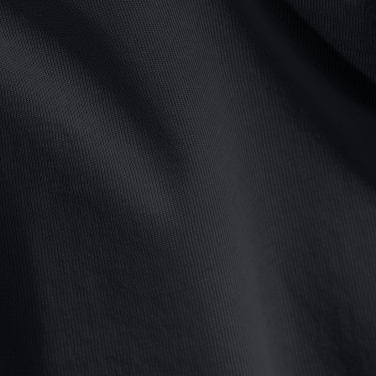 Close-up of organic cotton jersey fabric with subtle texture