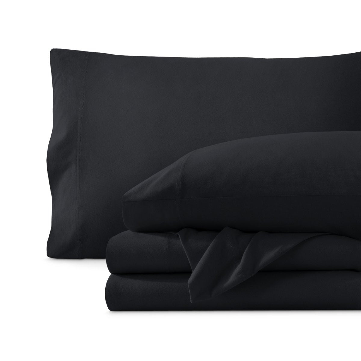 Set of organic cotton jersey sheets on a white background