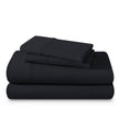 Organic jersey sheet set folded and stacked