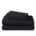 Organic jersey sheet set folded and stacked