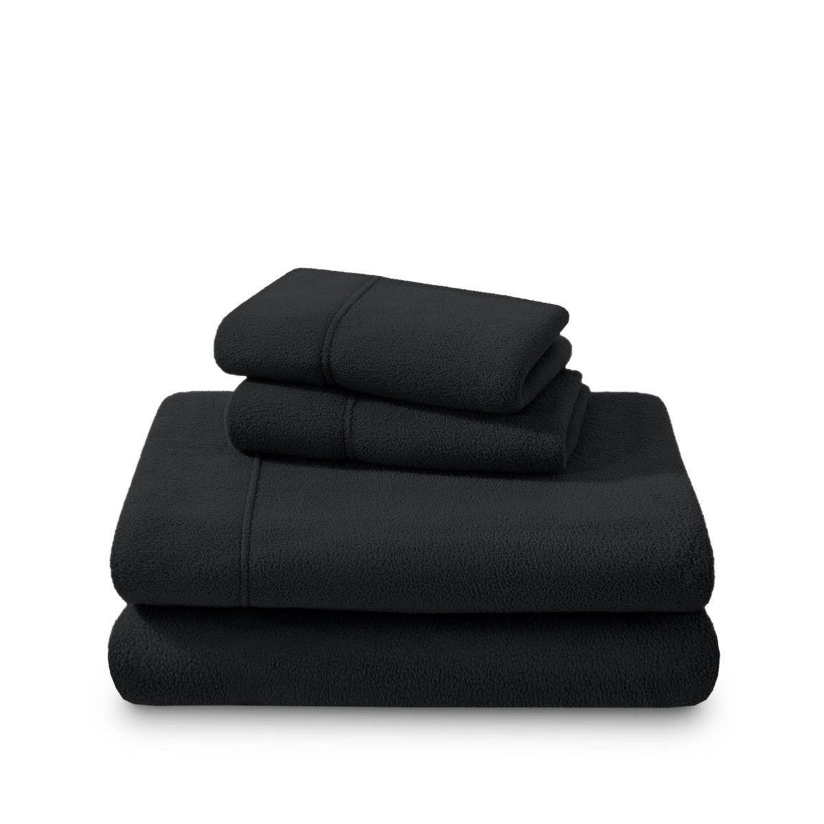 Polar fleece sheets and pillowcases folded and stacked on a white background