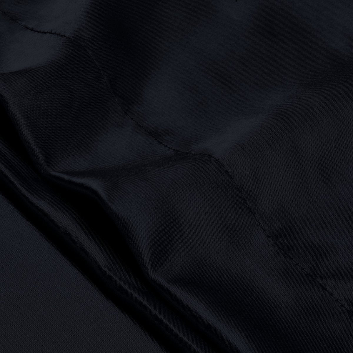 Close-up of the envelope closure on the satin pillowcase